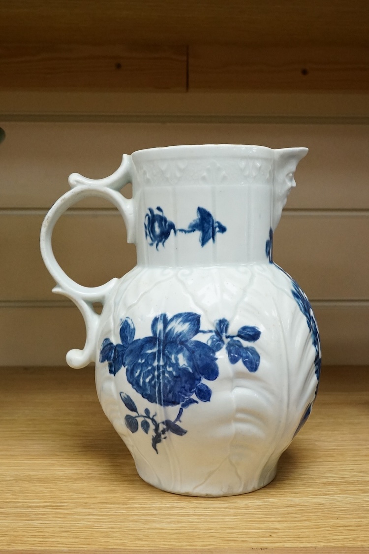 A Caughley blue and white transfer printed mask jug, c. 1780, 21cm high